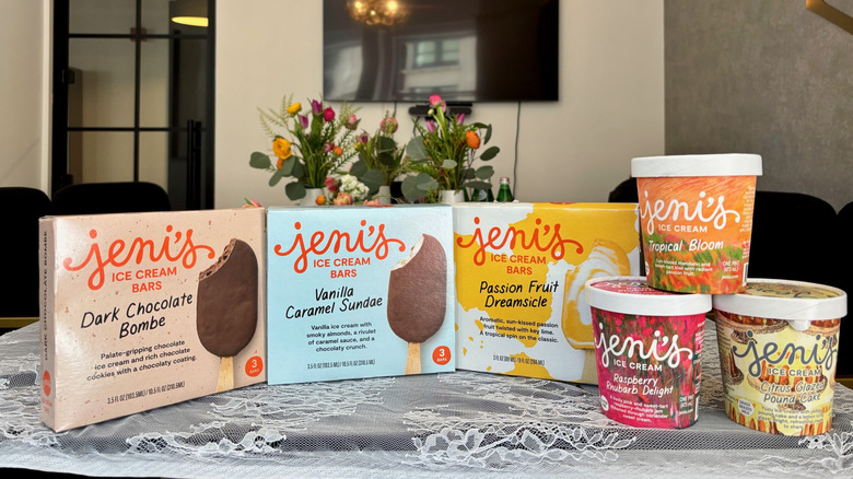 Jeni's ice cream Spring Collection pints on a table next to three boxes of ice cream bars