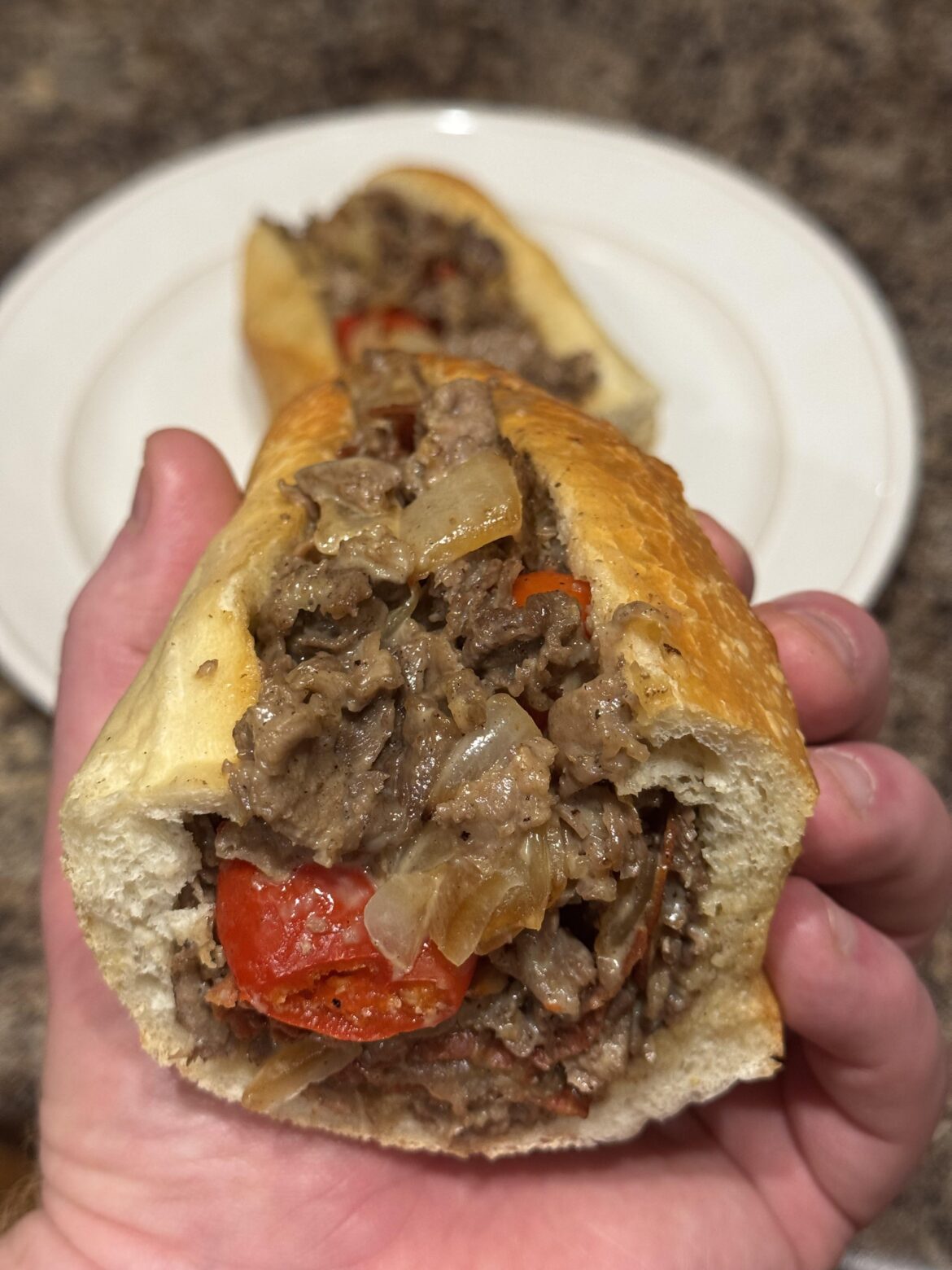 Cheesesteak with American, onions, pepperoni, and Peppadews
