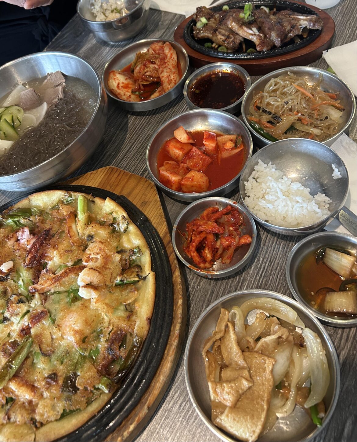 Woomiok in San Diego :) We got cold noodles, galbi, and seafood pancake. Sooo good!