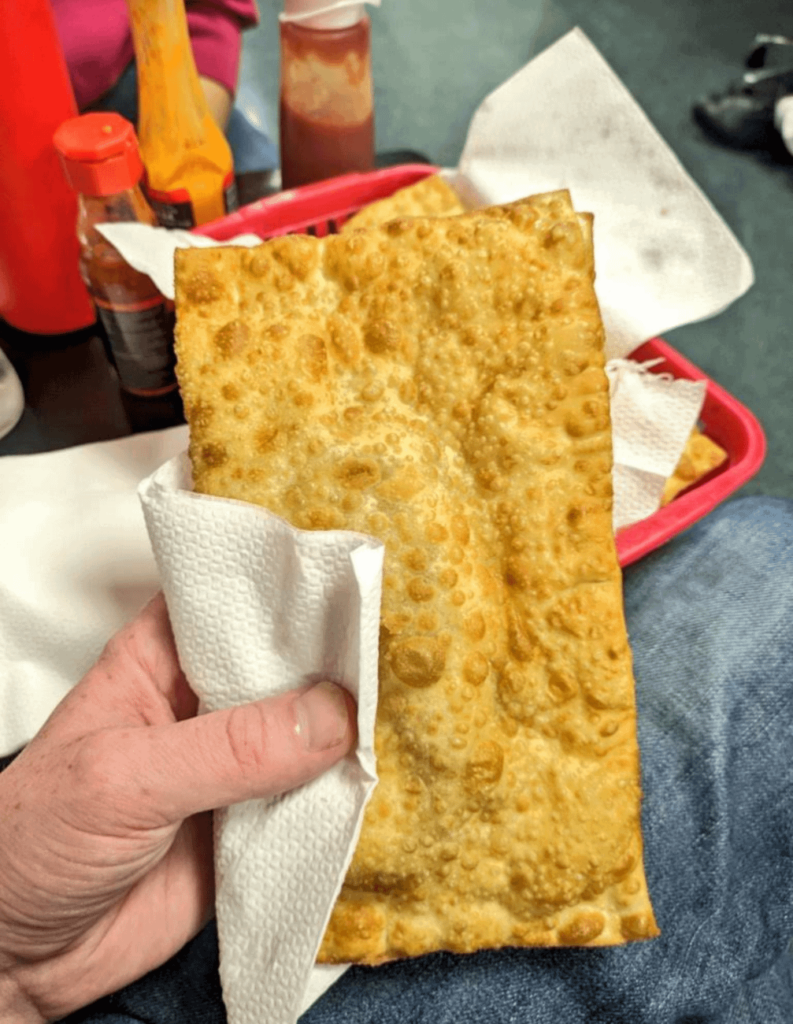 This deep fried pastry is full of beef and cheese - Brazilian pasteis