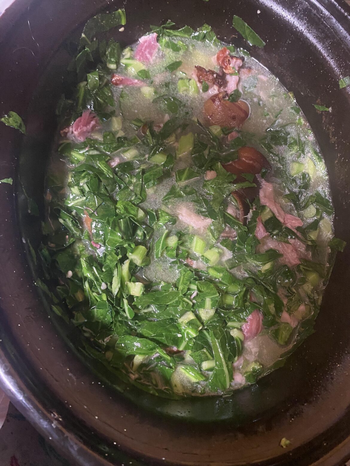 I didn’t want to spend the entire day cooking greens, so I put it in the slow cooker. Wish me luck! 🤞🏿