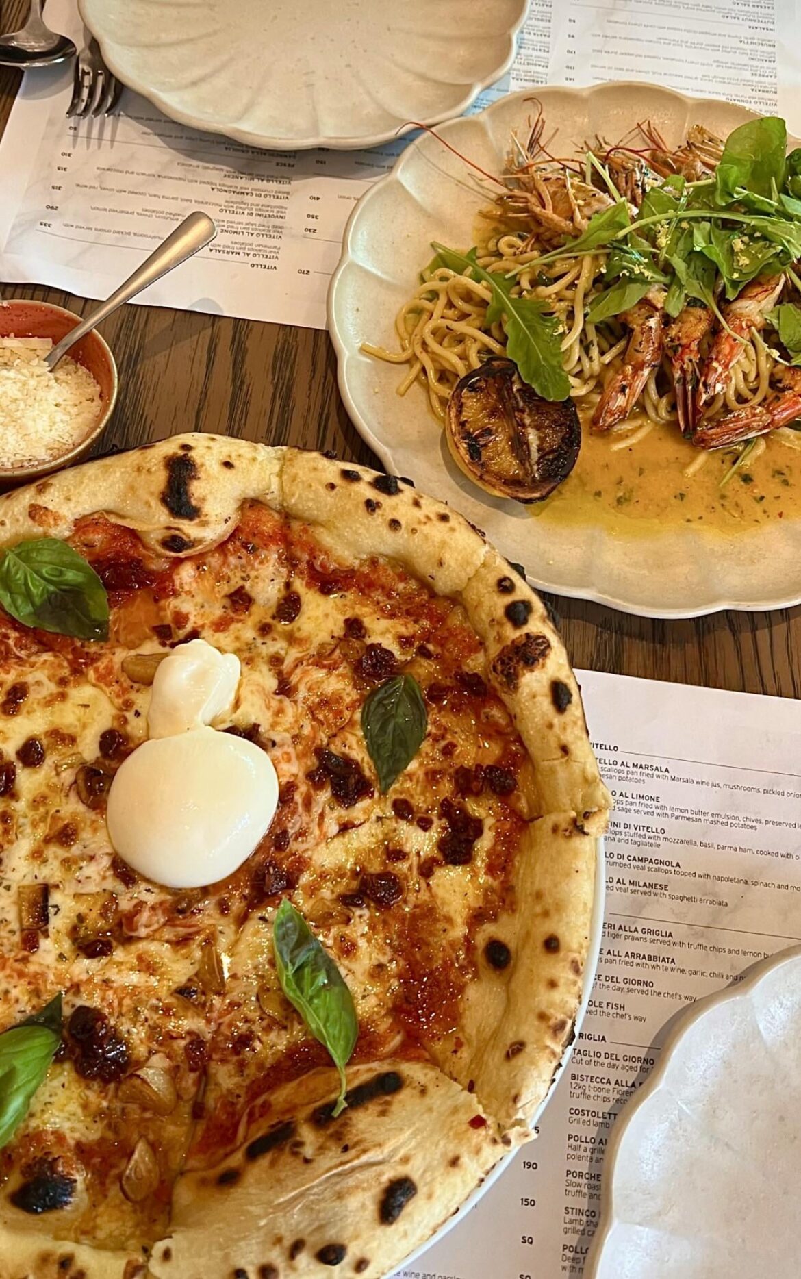 Burrata Pizza and Seafood Pasta.