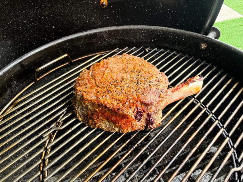 2 lbs Bone in Ribeye cooked on the Weber with mesquite charcoal for 1 hr at 300 F.