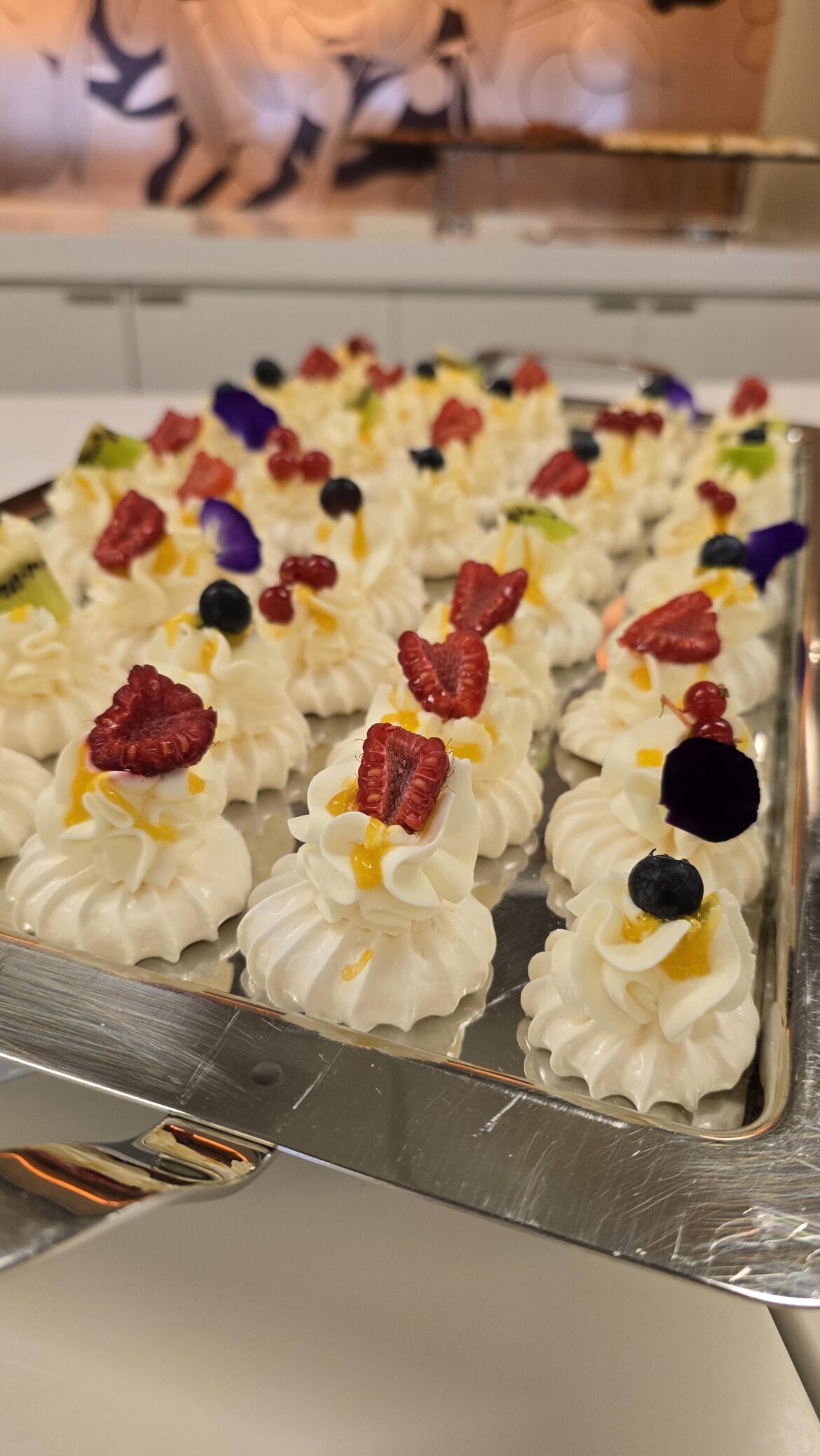 Pavlovas with ganache Montée and passion fruit gel