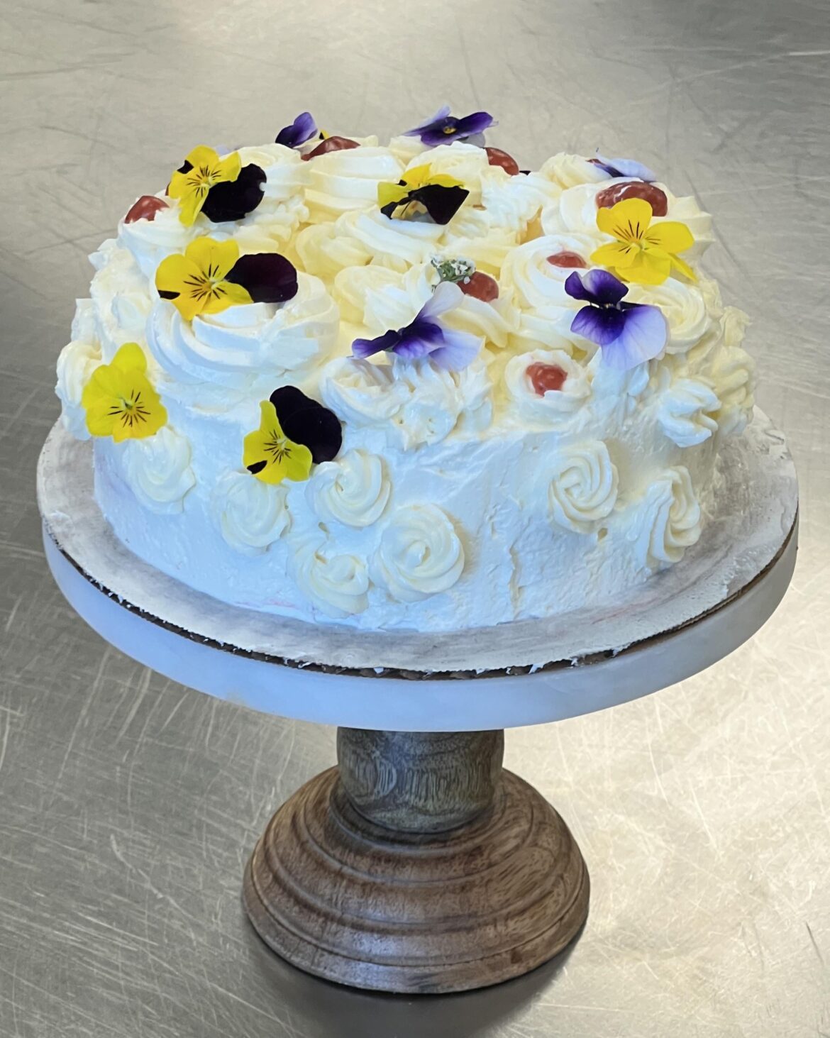 Made a Vanilla Strawberry Cake with Vanilla Buttercream and Strawberry Filling