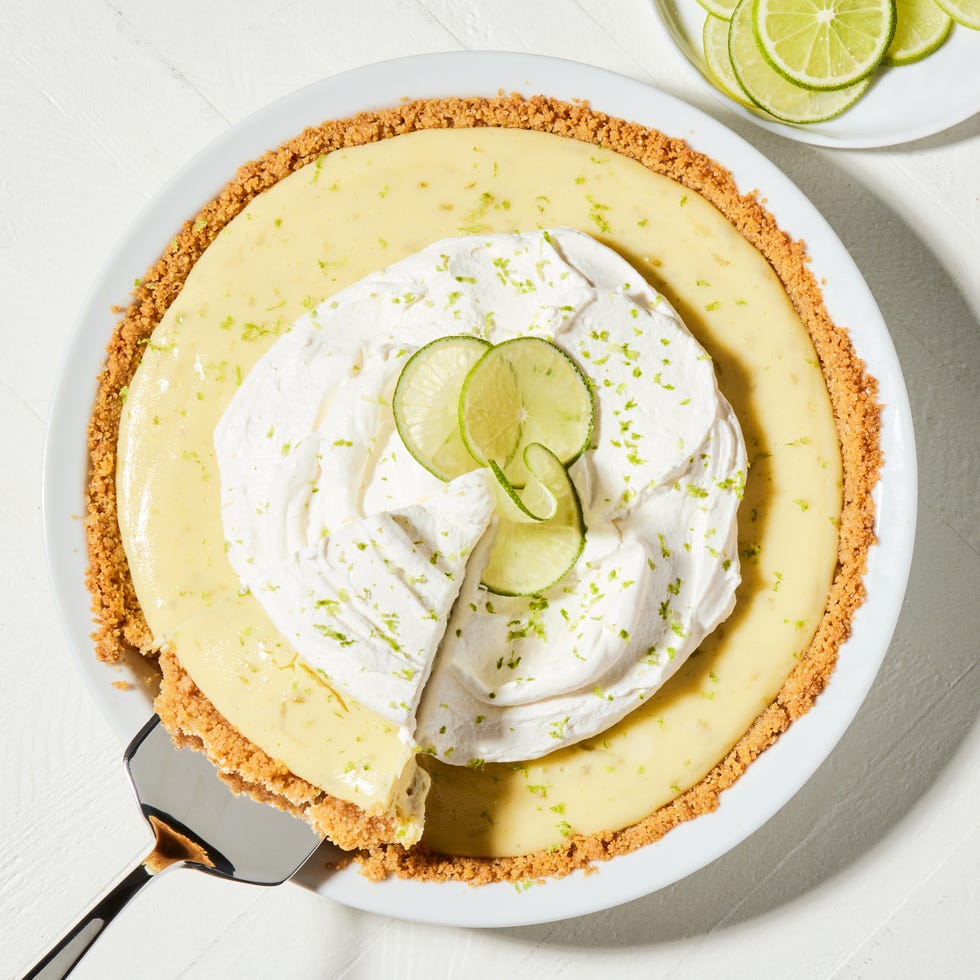key lime pie with whipped cream and lime zest