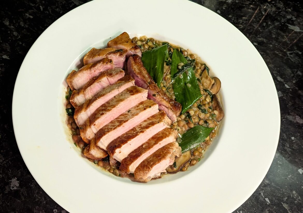 Pork chop, lentils and wild garlic