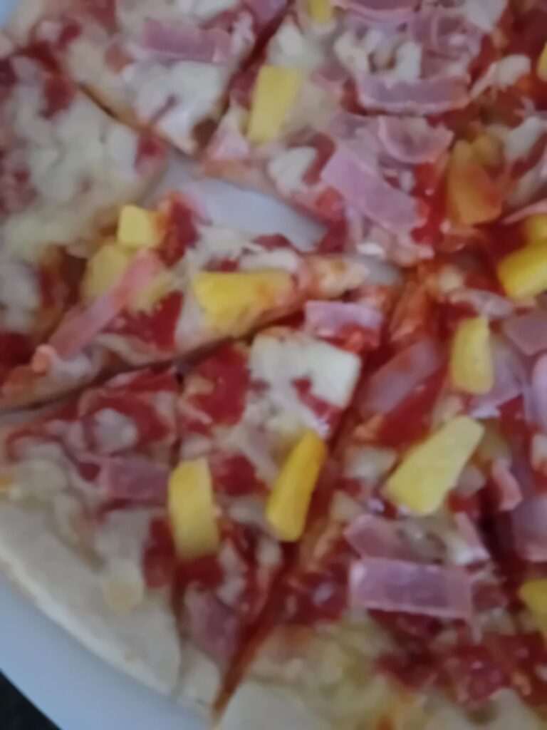 Dad strikes again with his horrendous chopping on my pineapple pizza
