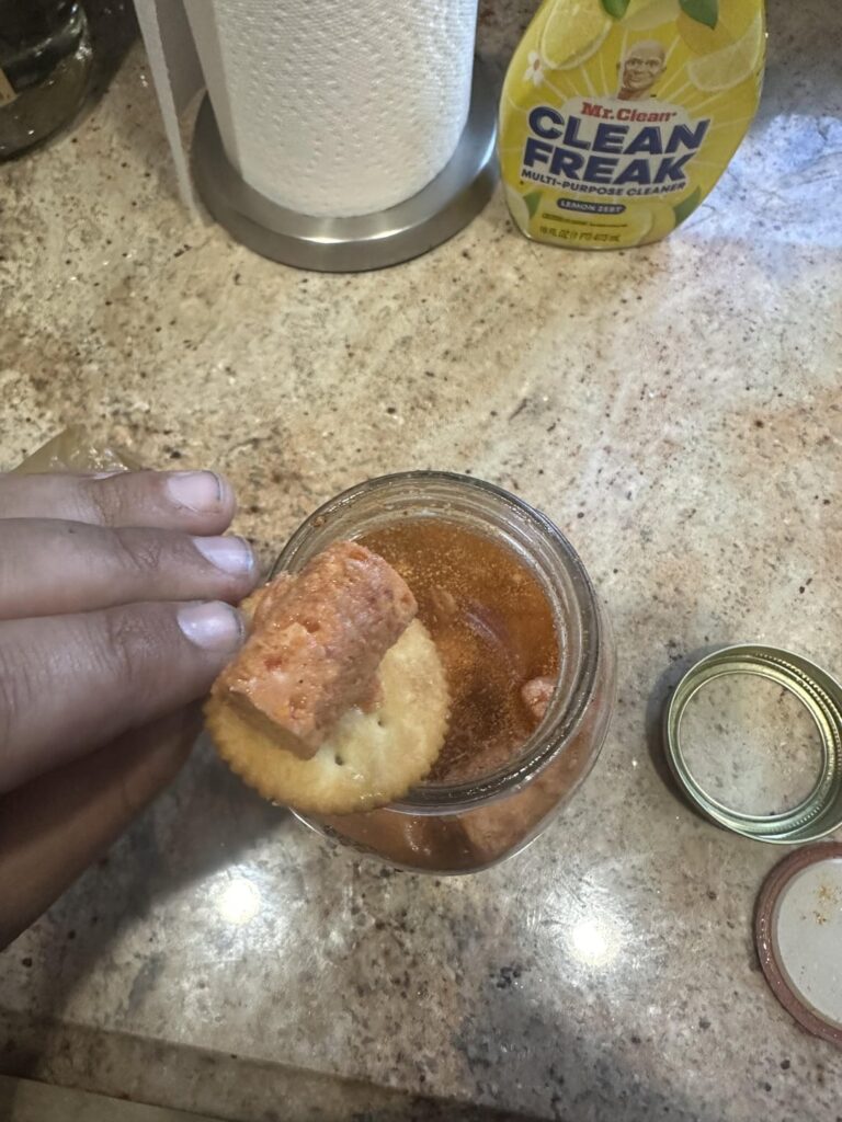 Pickled pepperoni on a cracker