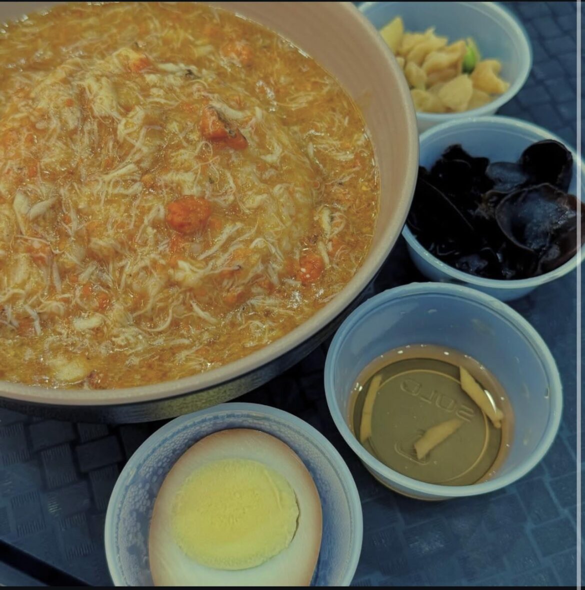 Is there a spot that makes this crab roe over rice dish?