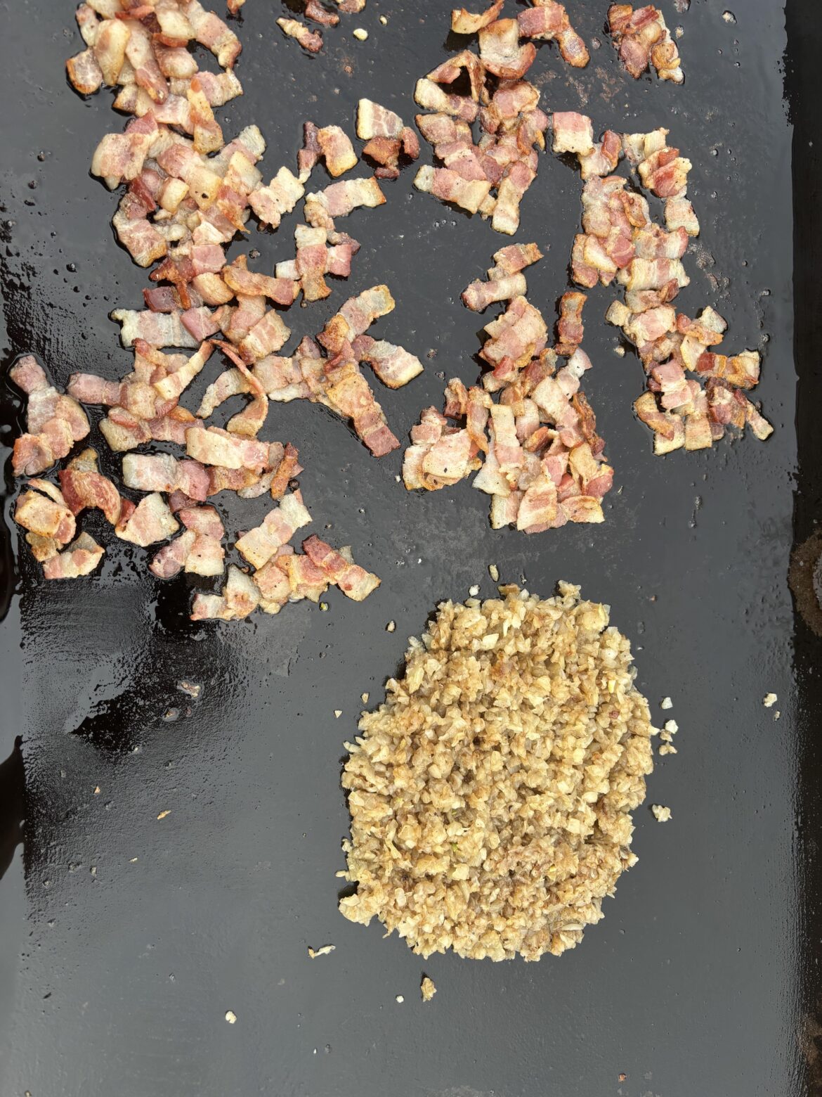 Onions + bacon + blackstone… ps, they’re not done yet