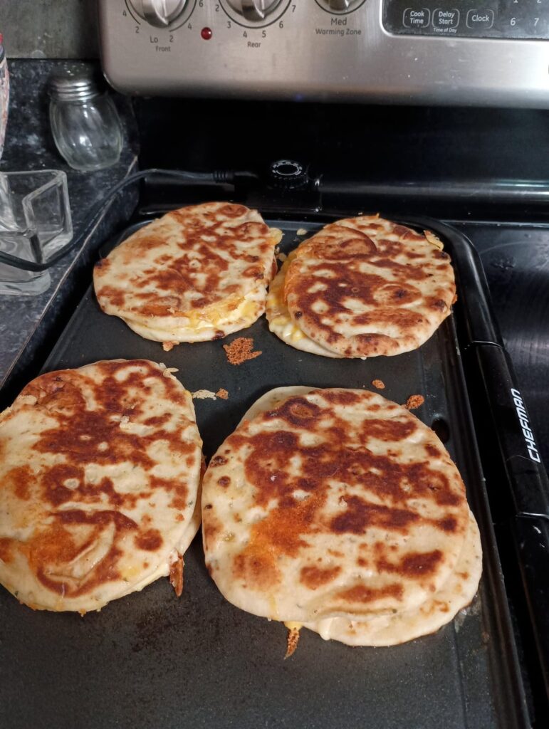Gouda and cheddar on garlic naan from Aldi.