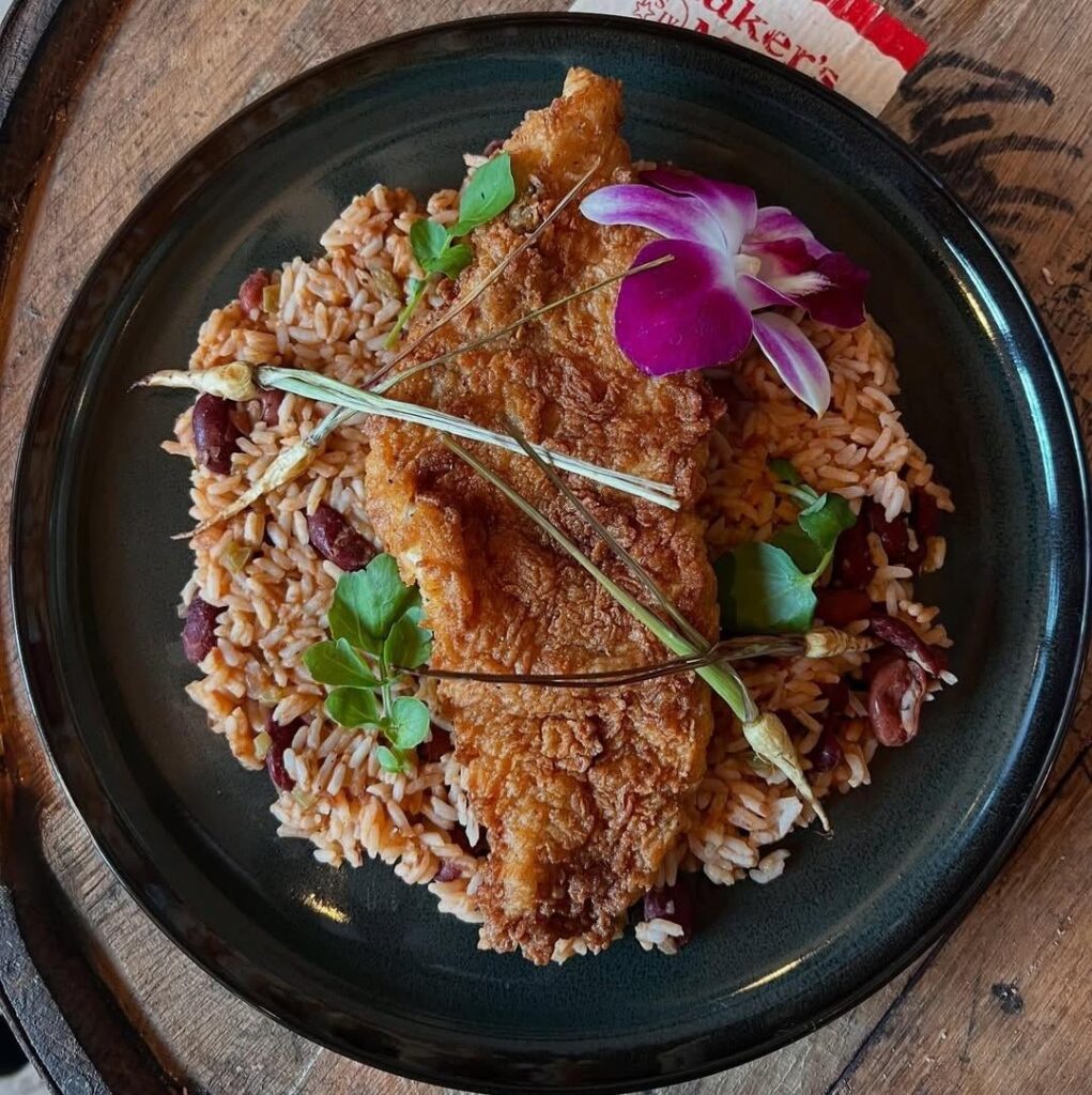 Fresh local fried catfish, red beans and rice, mini parsnip, and watercress