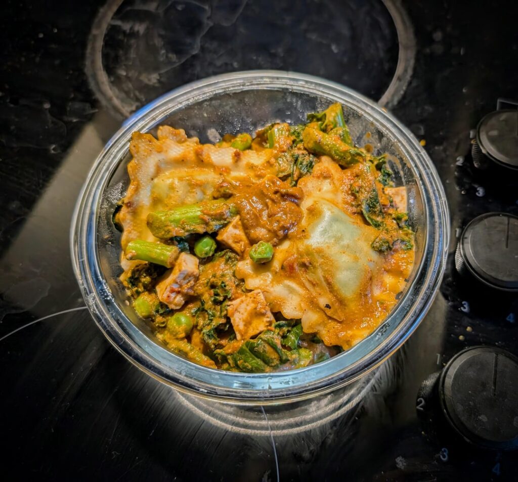 Ravioli, tofu & veg in a tomato tahini sauce Ravioli, tofu & veg in a tomato tahini sauce