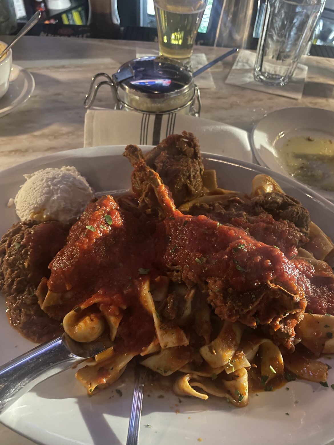 Hot take the best red sauce joint in the area is out at Capri by Gigis out in Burr Ridge. Bricole and pork neckbones sauce over Pappardelle 🤌🏽