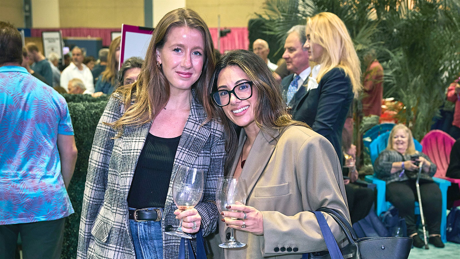  Two attendees at the 2024 Palm Beach Food & Wine Festival