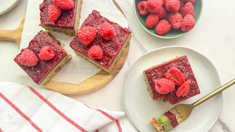 Sliced squares of matcha and raspberry bars
