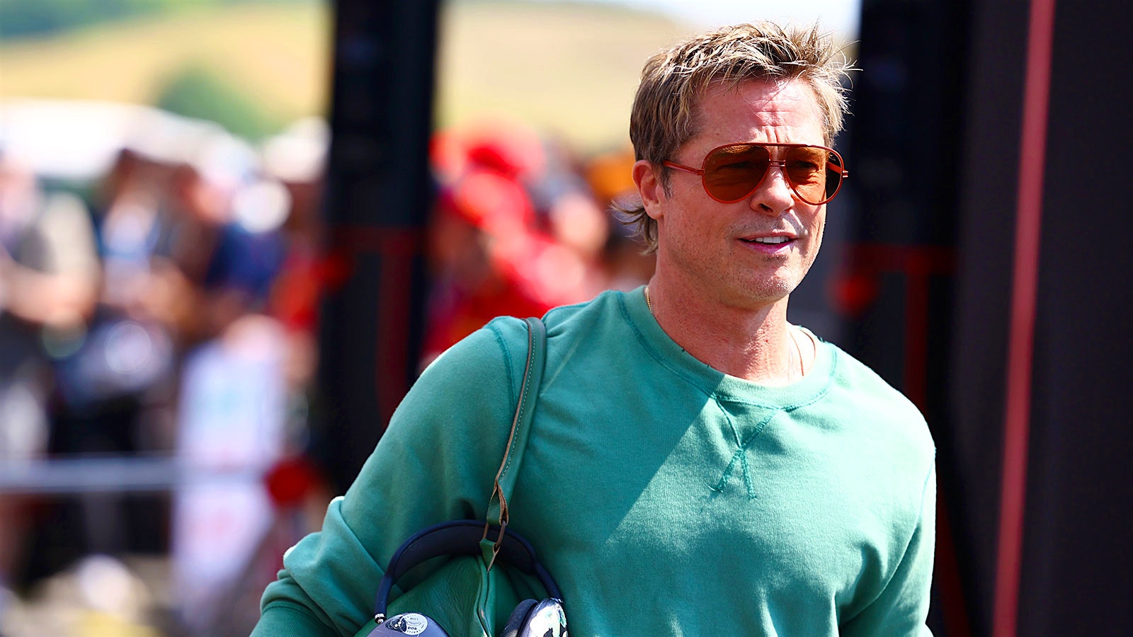 Brad Pitt on a Formula One race track.