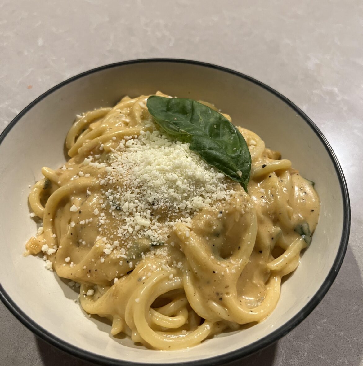 Cheesy shallot and basil pasta