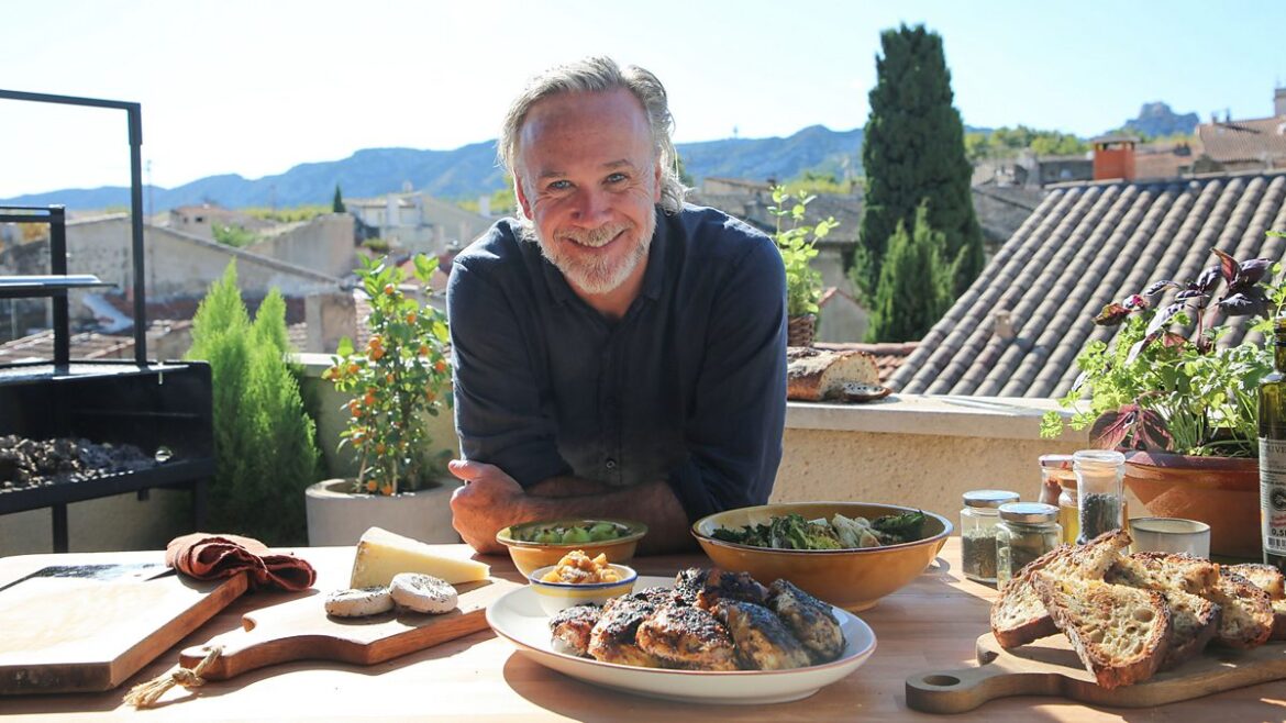 How to create the tastes of Provence at home Marcus Wareing sitting outside in Provence with freshly prepared food in front of him