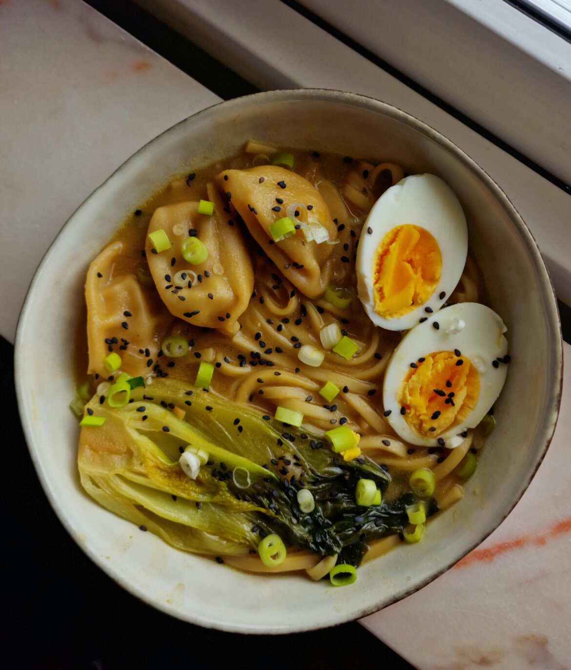 Homemade miso ramen with dumplings
