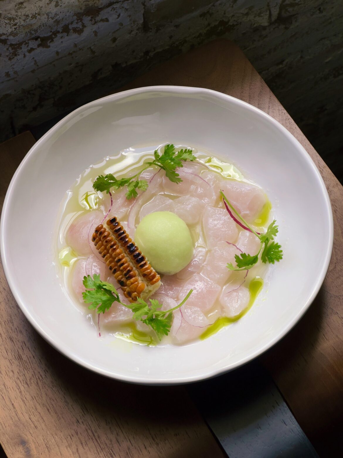 Snook ceviche, ‘pimenta-de-cheiro’ leche de tigre, lime leaf oil, cucumber sorbet