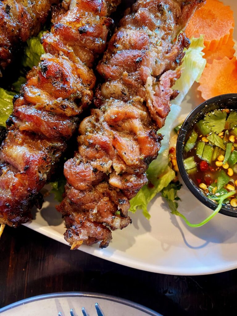 luv2eat thai bistro - moo ping + yellow fish curry