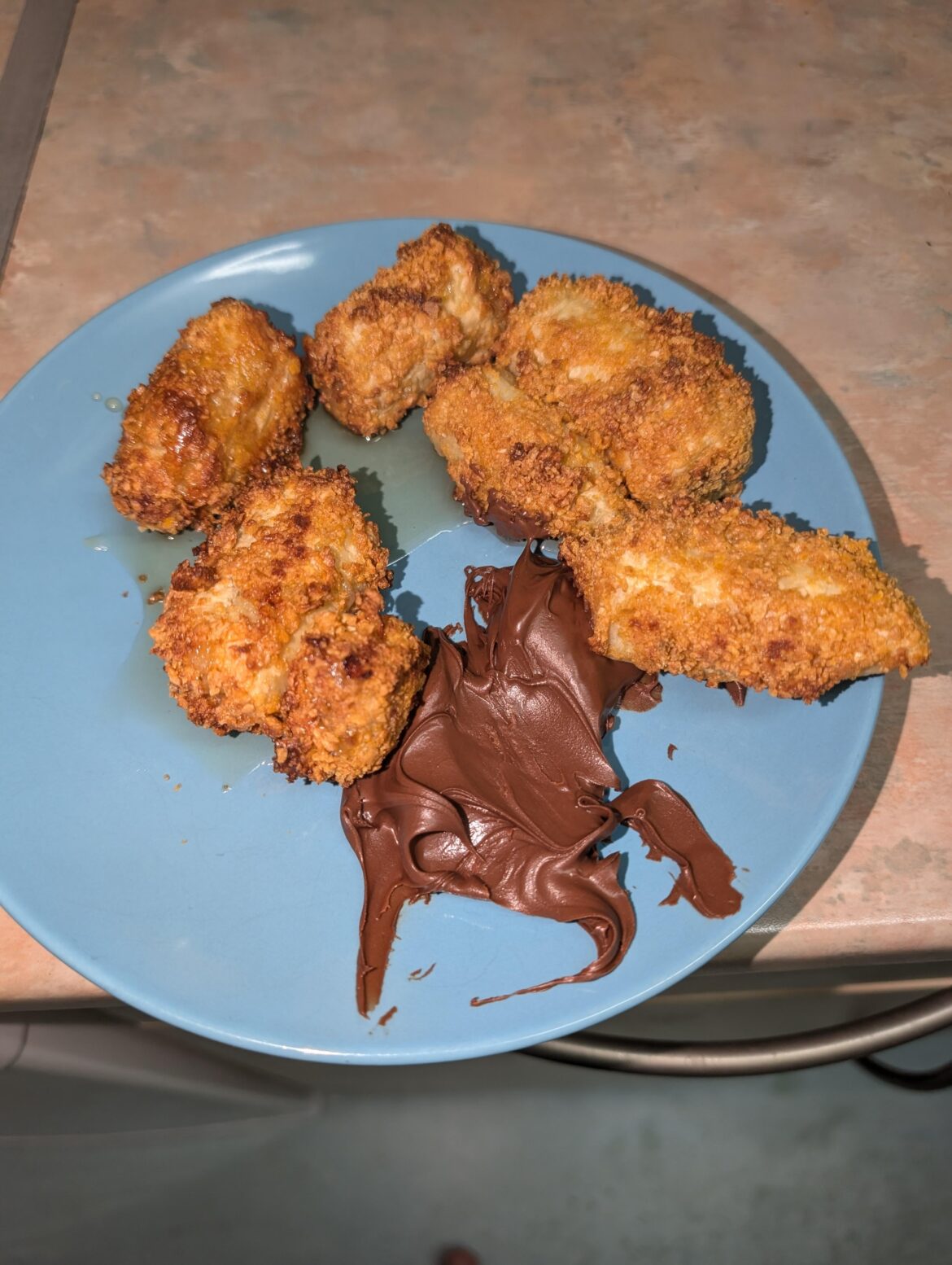 I ground frosties into powder and coated some pieces of banana before putting it in the air fryer and eating with maple syrup and Nutella