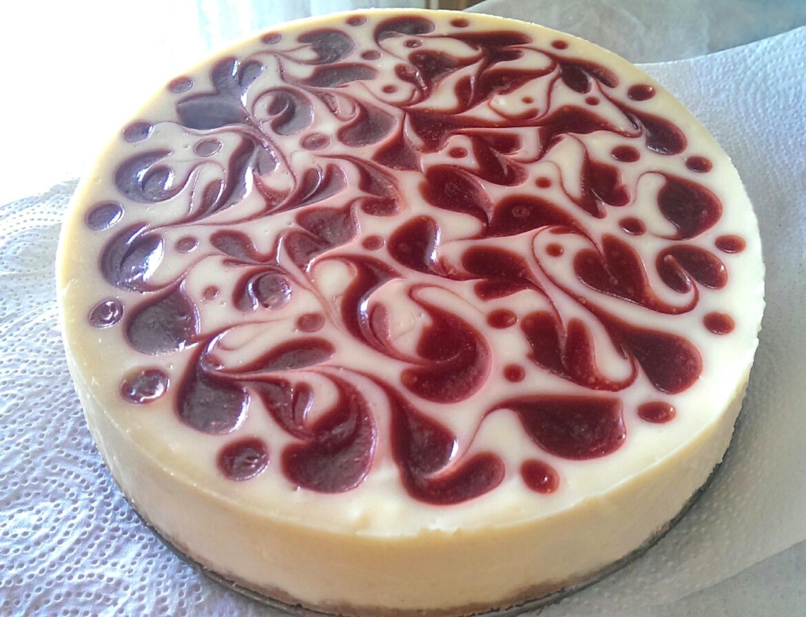 Raspberry swirl graham cracker New York style cheesecake