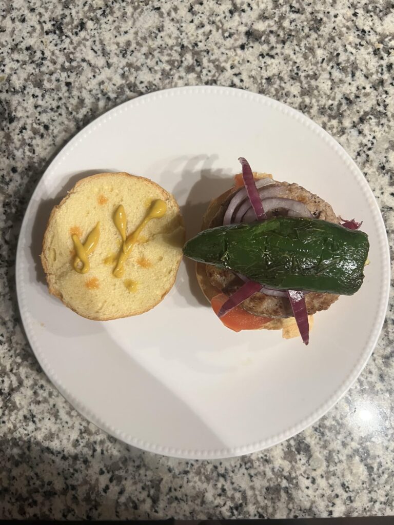 Just made a turkey burger w/ roasted jalapeño + some Carolina Reaper sauce on the bun