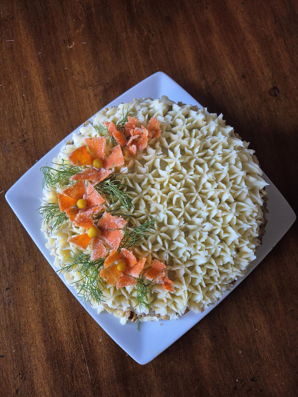 Carrot cake with candied carrot flowers