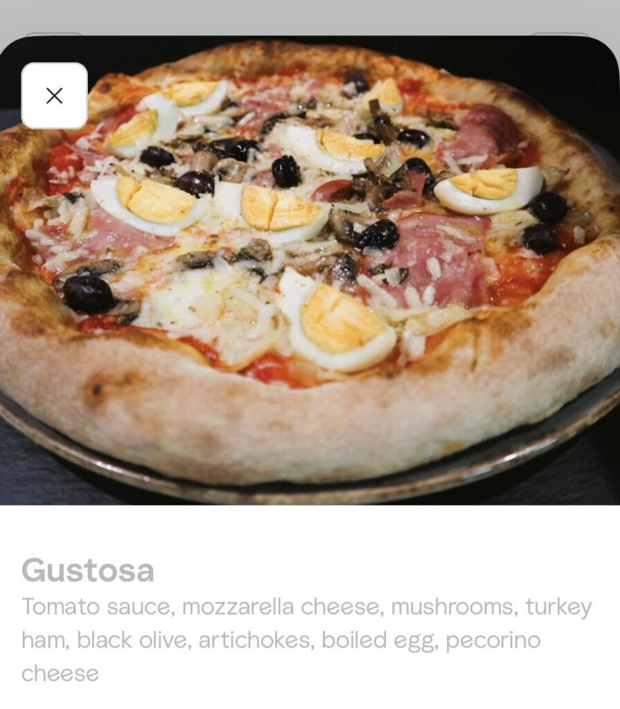 Pizza with boiled egg