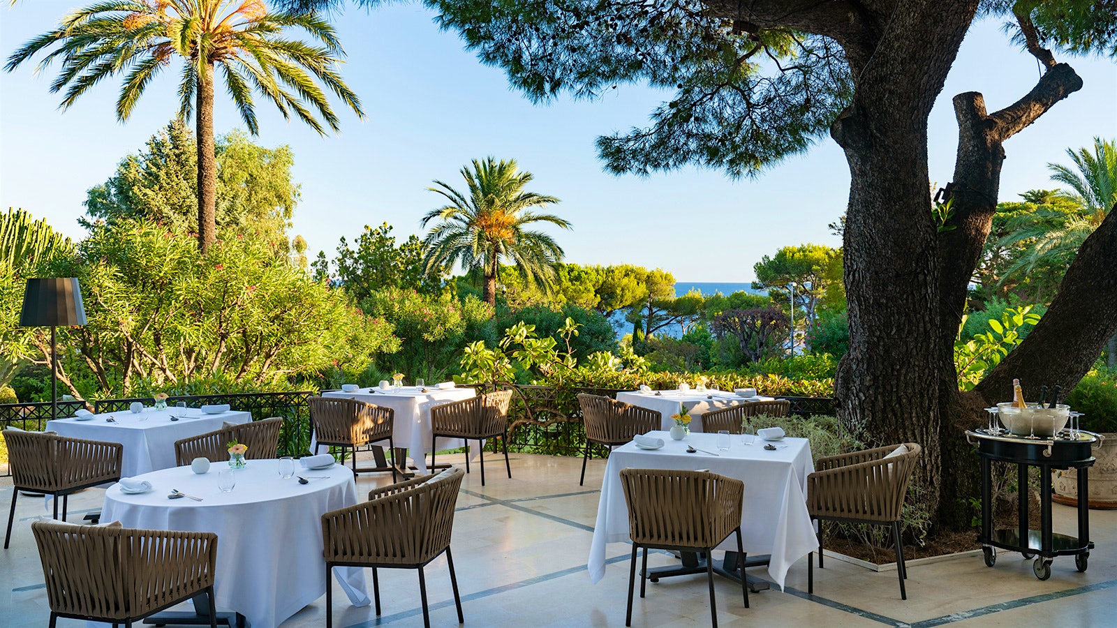  A set table on the terrace of Le Cap, with views of the Mediterranean