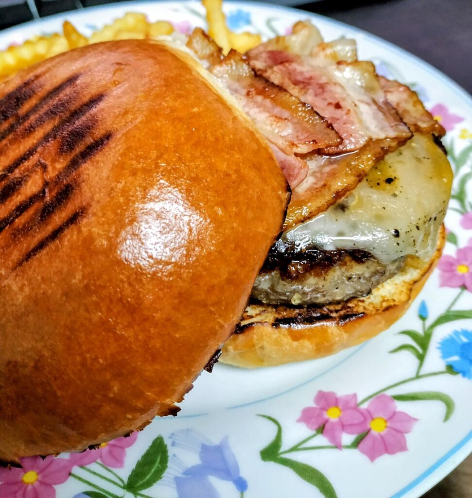 Bacon cheeseburger on homemade brioche buns
