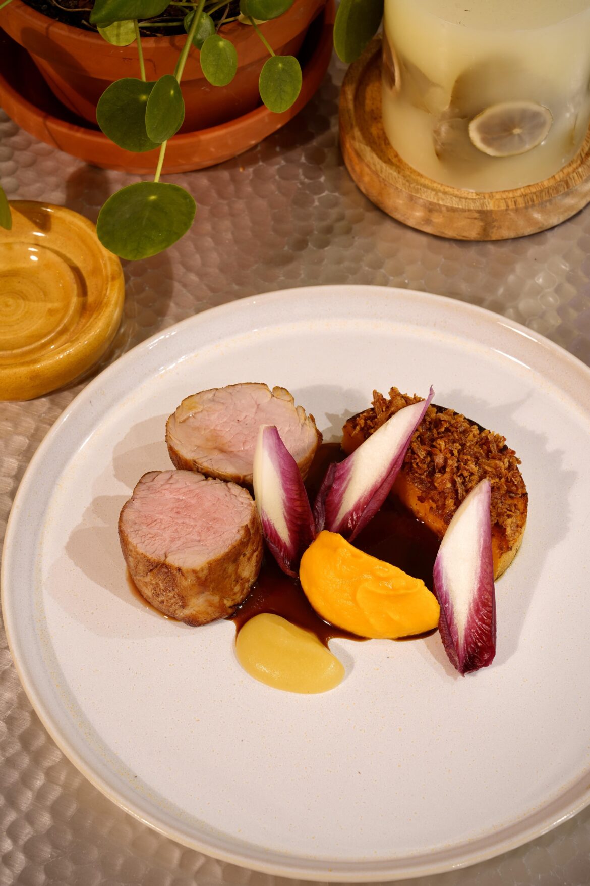 Roast pork tenderloin, squash “fondant”, purée of squash, caramelised apple, sherry sauce.