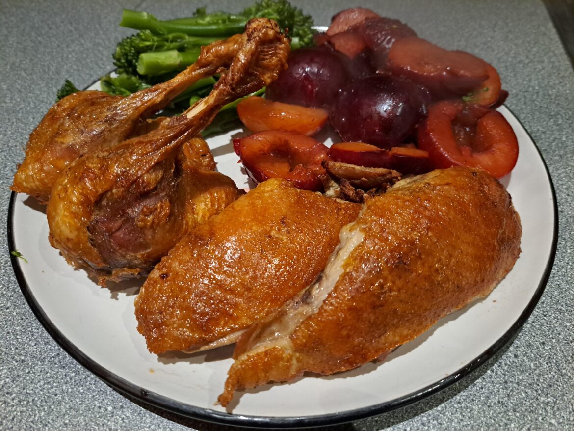 Roast duck with plums and brocoli
