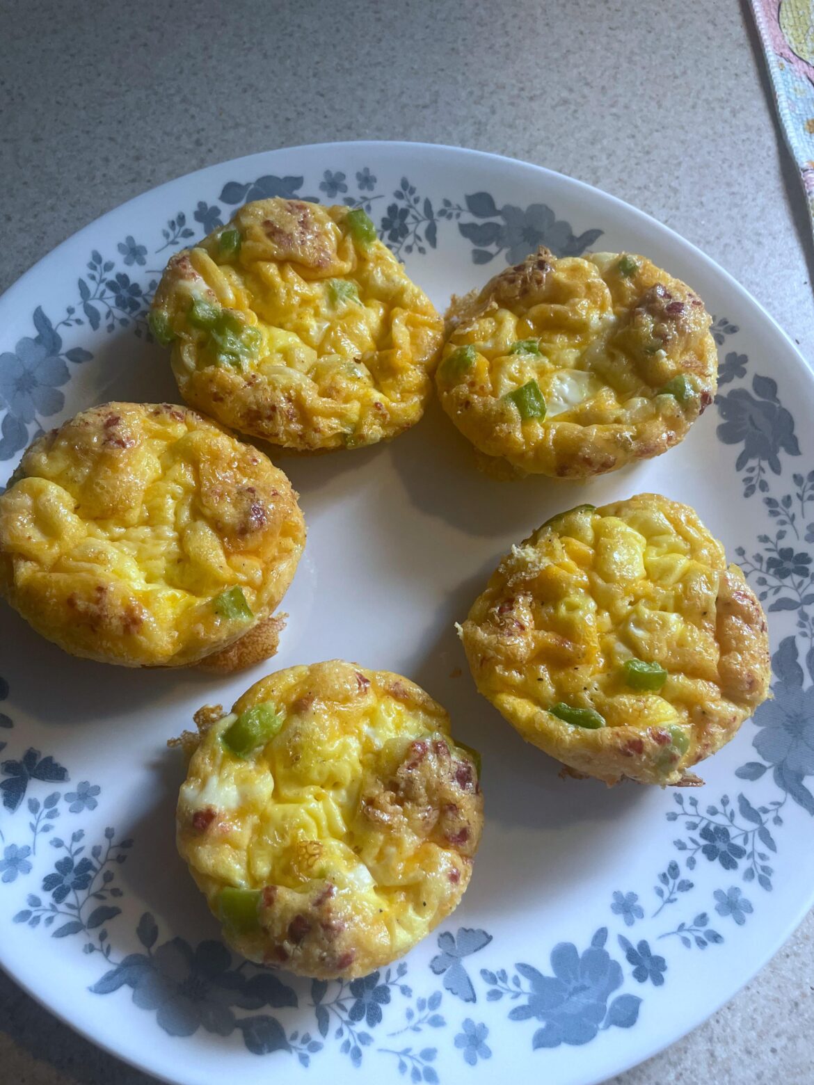 Ham egg muffins with cheese and bacon bits on top for 105cal each. Bf and I killed these lol