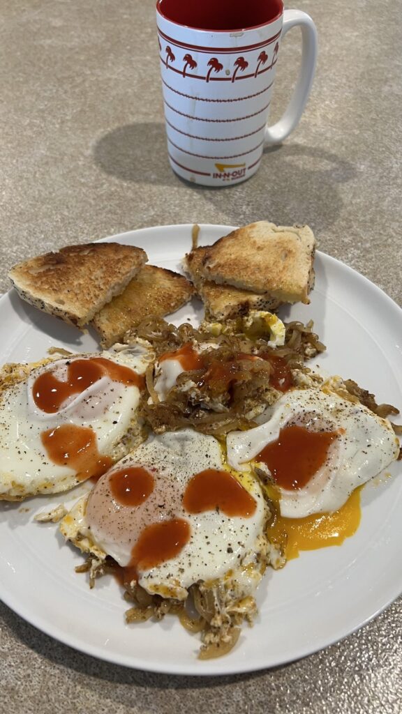 Friday indulgence: four eggs and a whole white onion with sourdough