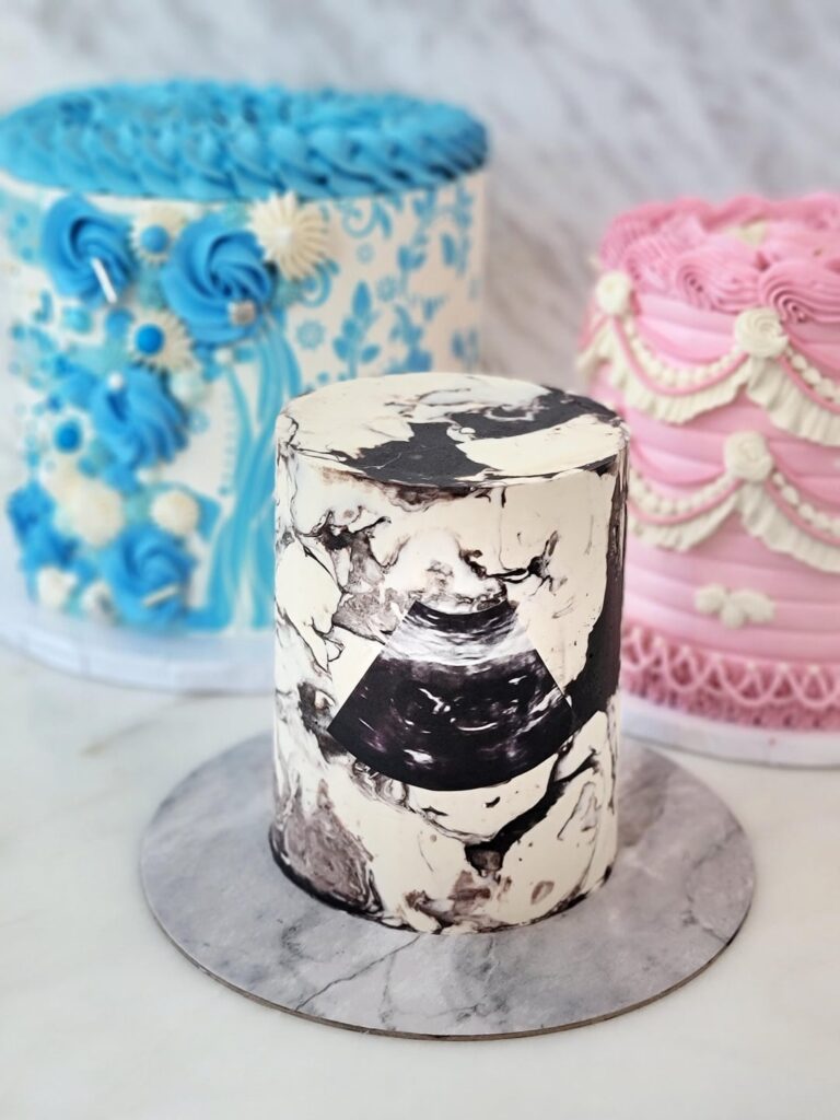 Throwback to hidden pregnancy announcement cake