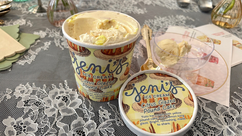 Open pint of Jeni's Citrus Glazed Pound Cake and scoop in a dish on a lacy tablecloth