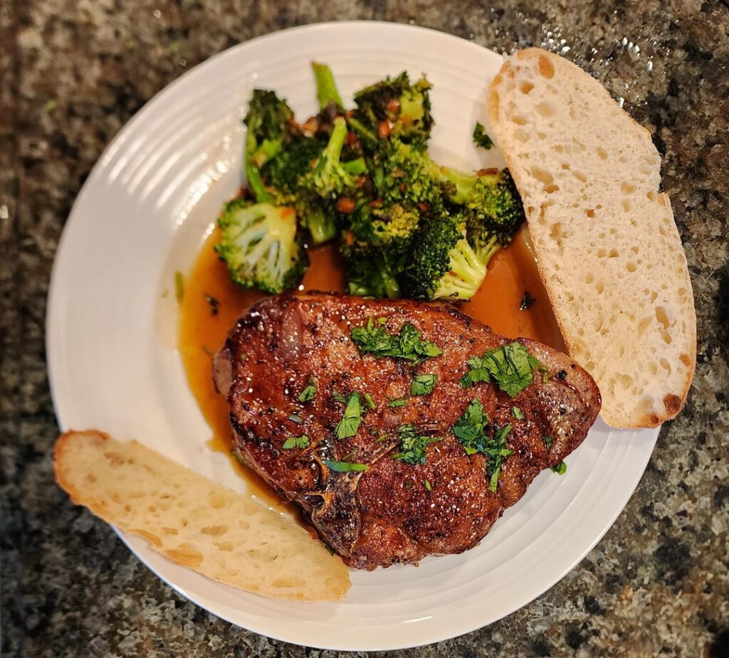 Habenero and honey glazed pork chops with broccoli and fresh sourdough