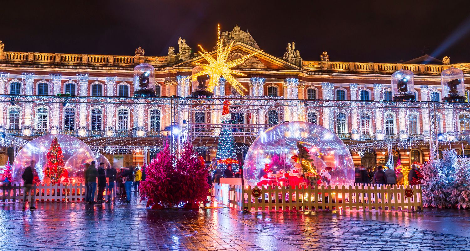 Christmas lights and celebrations at the Place du Capitole at night in Toulouse, Haute Garonne, Occitania, France
