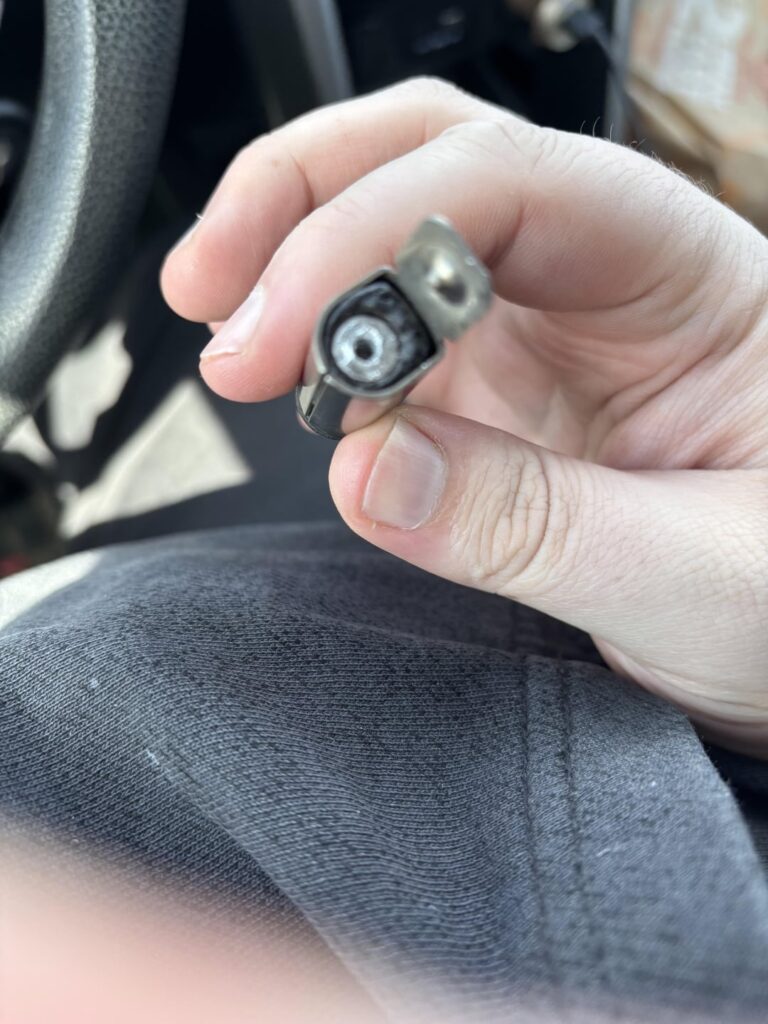 Glowplug’s bottom part is broken off inside the connection, any idea how to get it out?