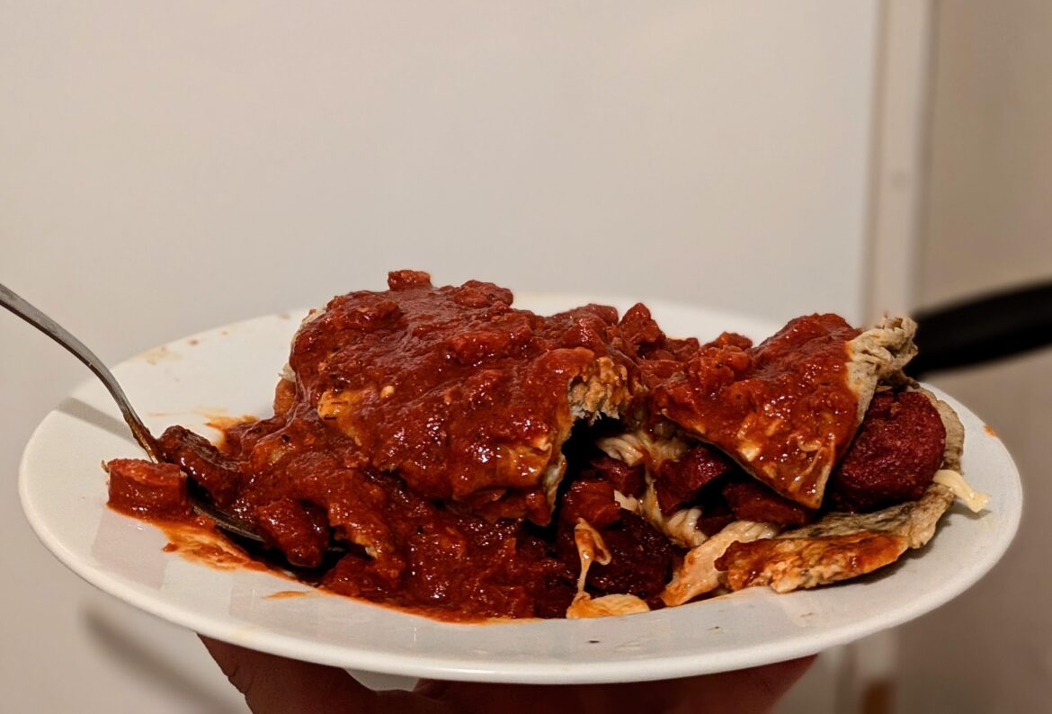 Cheese, chorizo, and salami omelette, with spicy tomato sauce.