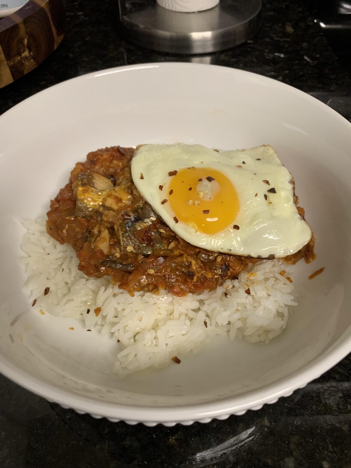 Sardines with tomato, egg and rice