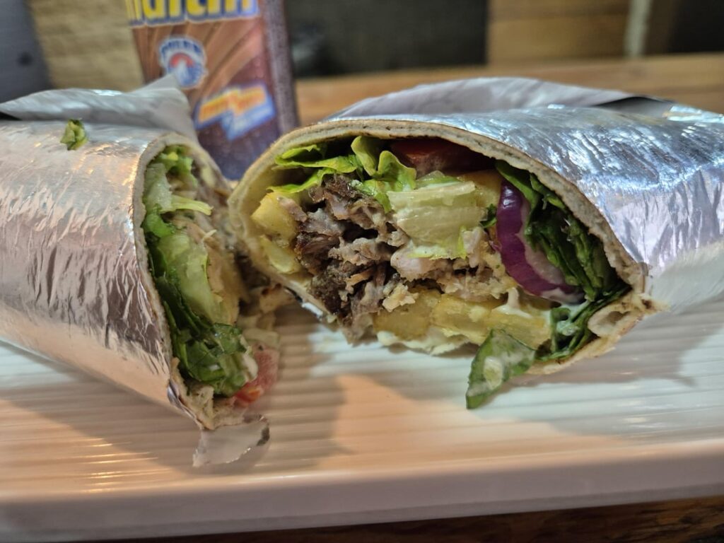 Shawarma with Venezuelan non-alcoholic malt beverage (Maltin Polar) and garlic sauce