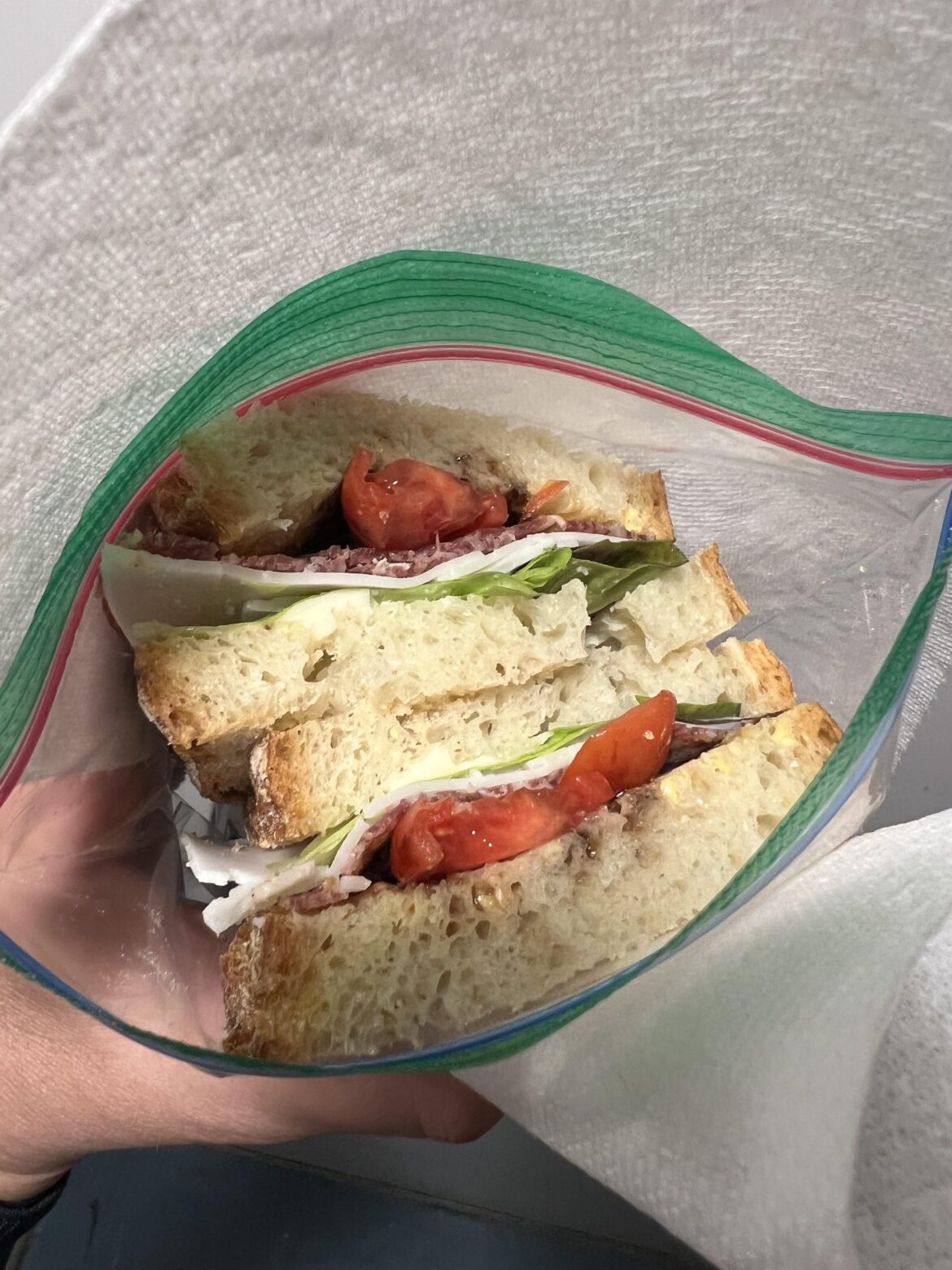 Missed lunch and asked my wife to fix me a sandwich. She handed this to me on my way out. Looked at it in the elevator and realized she really does love me. Home made bread, goat gouda, salami, cherry tomatoes, lettuce, mayo mustard and balsamic glaze 👌