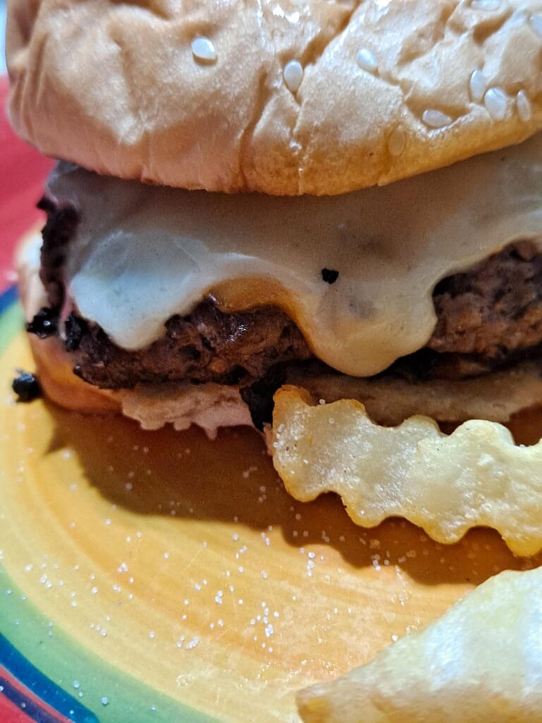 DOUBLE SMOKED CHEDDAR AND SWISS CHEESE melted over my first SMASH BURGER. (I think) Aren't all homemade burgers smash burgers? Enlighten me someone 😌