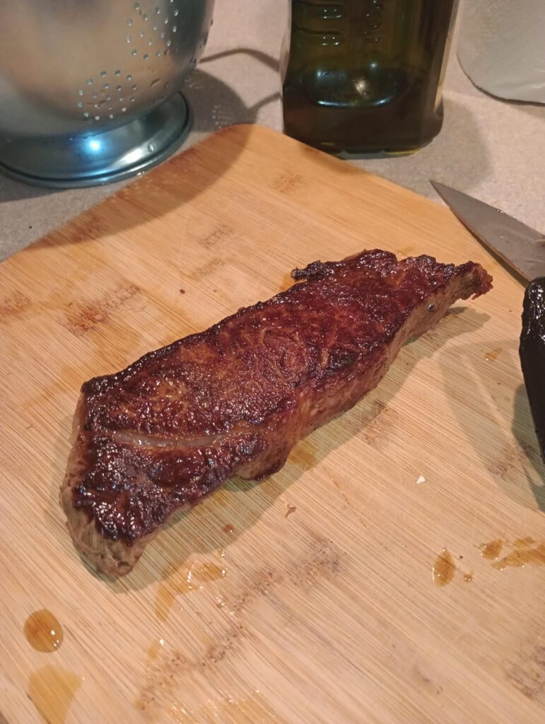 Strip steak and mushrooms