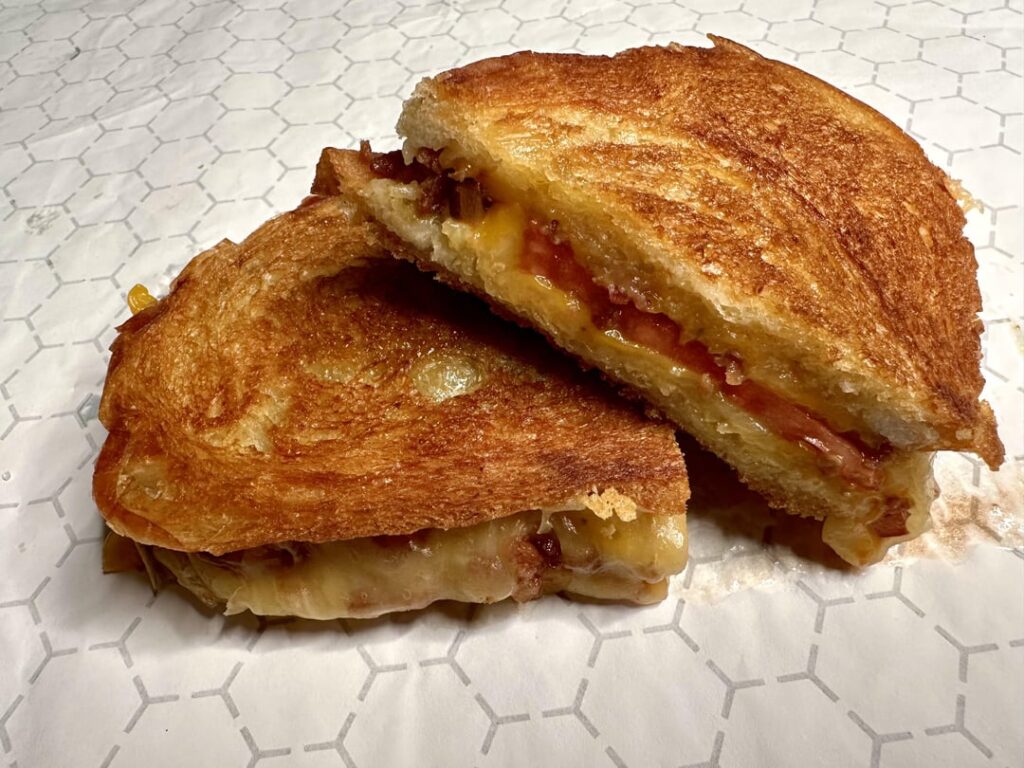 Sweet and spicy tomato and cheese melt on homemade bread